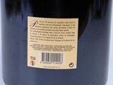 a bottle of wine that is sitting on a table