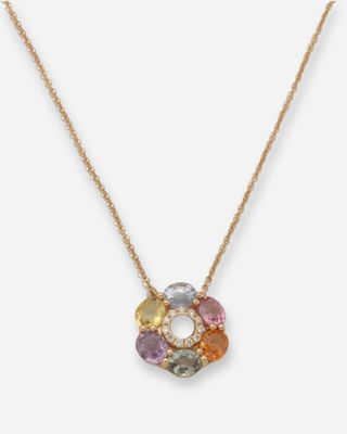 un collier en or orné de pierres multicolores montées sur une chaîne