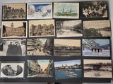 many old photos of people and buildings on the wall