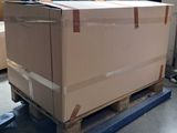 a large box sitting on a pallet in a warehouse