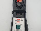 an image of a remote control with a cable connected to it