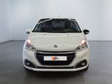 the front view of a white car in a white room