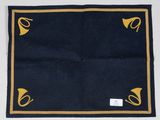an image of a black and gold table cloth with a design on it