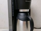 a coffee maker that is sitting on a counter