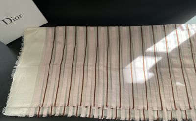 a close up of a table cloth with a box on it