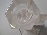 a glass of water sitting on top of a table
