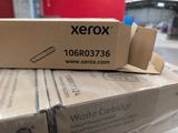 a cardboard box on top of a pile of boxes