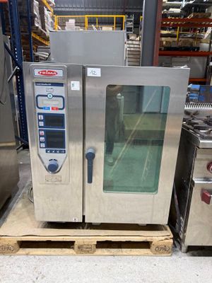 an image of a commercial oven sitting in a warehouse