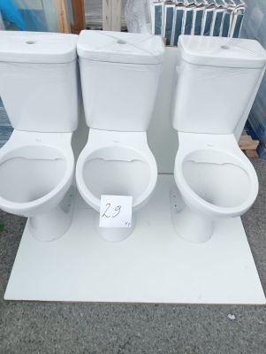 three toilets that are on display in a store