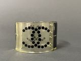 an image of a ring with black dots on it