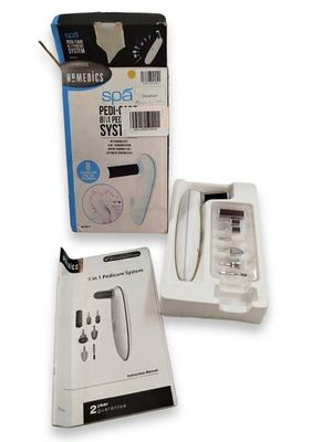 une boîte blanche contenant un appareil en noir et blanc