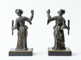 pair of antique bronze figurines of a woman and a man