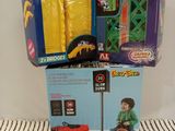 two boxes of toys that are sitting on top of each other
