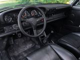 dashboard of a car with black leather seats and a steering wheel