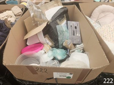a box full of baby items sitting on a table