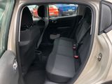 the back seats of a car are empty in the parking lot