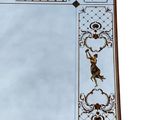 mirror with a design of a man and a woman on it