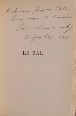 an open book with a handwritten poem on it sitting on top of a table