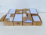 several boxes are stacked on top of each other on a table