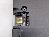 a close up of a cell phone with a sim card attached to it