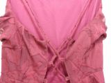 a picture of a pink top with ruffles on it