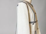a close up of a mannequin mannequin with a jacket on it
