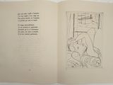 an open book with a drawing of a woman sitting on a couch