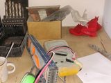 a desk with a bunch of items on it