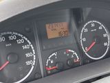a close up of a car dashboard with a speedometer and gauges
