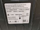 a close up of a sign on a metal door