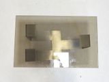a picture of a piece of metal with a cross on it
