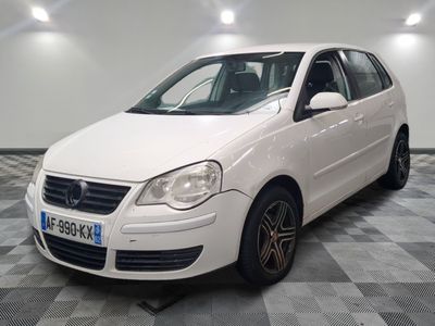 a picture of a white car parked in a garage