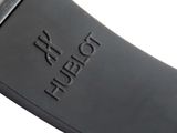 a close up of a knife on a white surface
