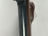 an old gun that is sitting on top of a table