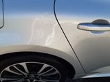a close up of a car ' s door handle on the side of the car