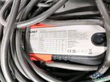 a close up of a power strip with wires on it