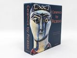 the book contains a blue cover with a painting of a woman ' s face