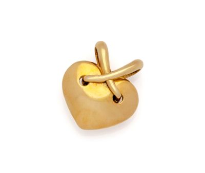 yellow gold plated heart shaped pendant with a knot around it