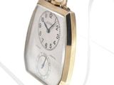 an image of a gold and silver pocket watch
