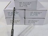 four boxes of black and white pens sitting on top of each other