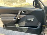 a picture of a car door with a handle on it