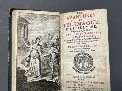 an old book with a picture of a man and a woman on it