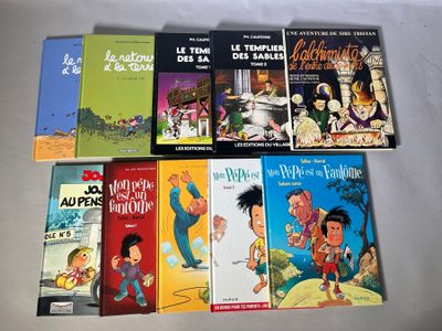 plusieurs livres pour enfants sont alignés sur une surface blanche