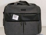 a close up of a suitcase with a tag on it