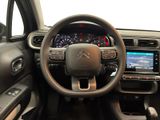 the interior of a car with a steering wheel, dashboard, and dash board