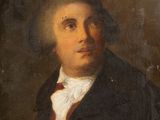 portrait d'un homme en manteau noir et cravate rouge