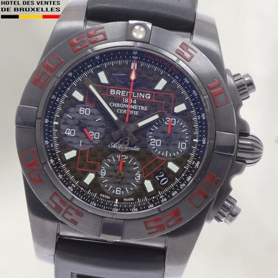 a close up of a wrist watch with a red second hand