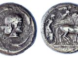 a close up of a coin with a horse on it