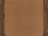 an old wooden frame with a brown paper backing