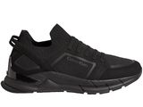 men ' s black sneakers with a rubber sole and a rubber sole